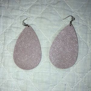 Nickel and Suede brand leather earrings